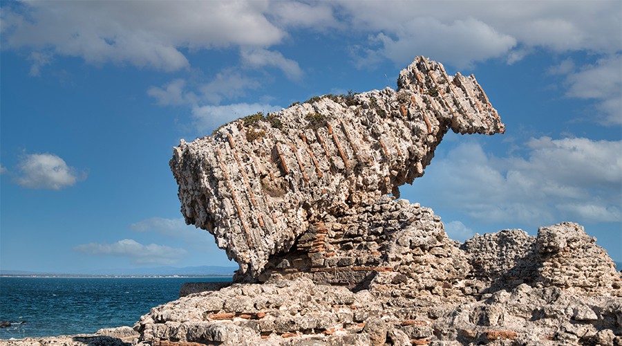 A triangular fragment of a ruined Tharros bath complex 