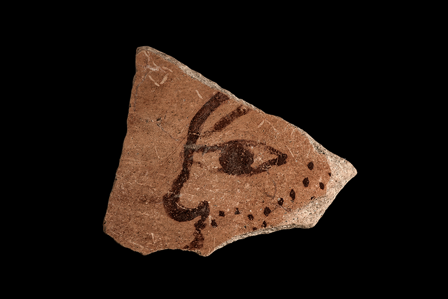From the artisans’ quarter, a ceramic fragment with the profile of a male face. From the artisans’ quarter in Tharros, a ceramic fragment with the profile of a male face.