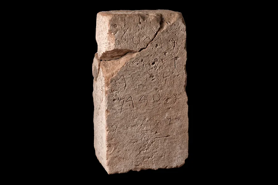 Tharros rectangular tombstone with an inscription.