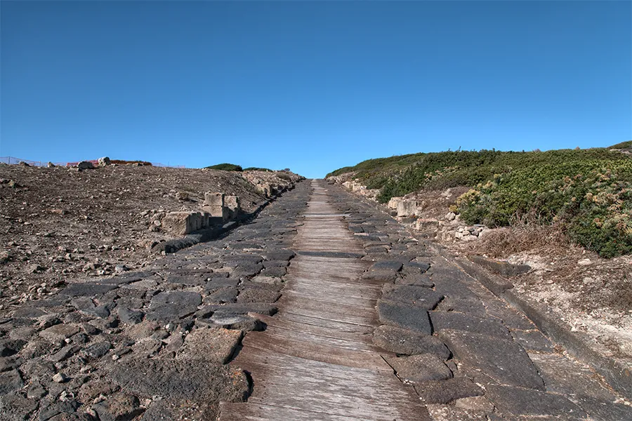 The stone paving of the main north-south street in Tharros, the cardo maximus.